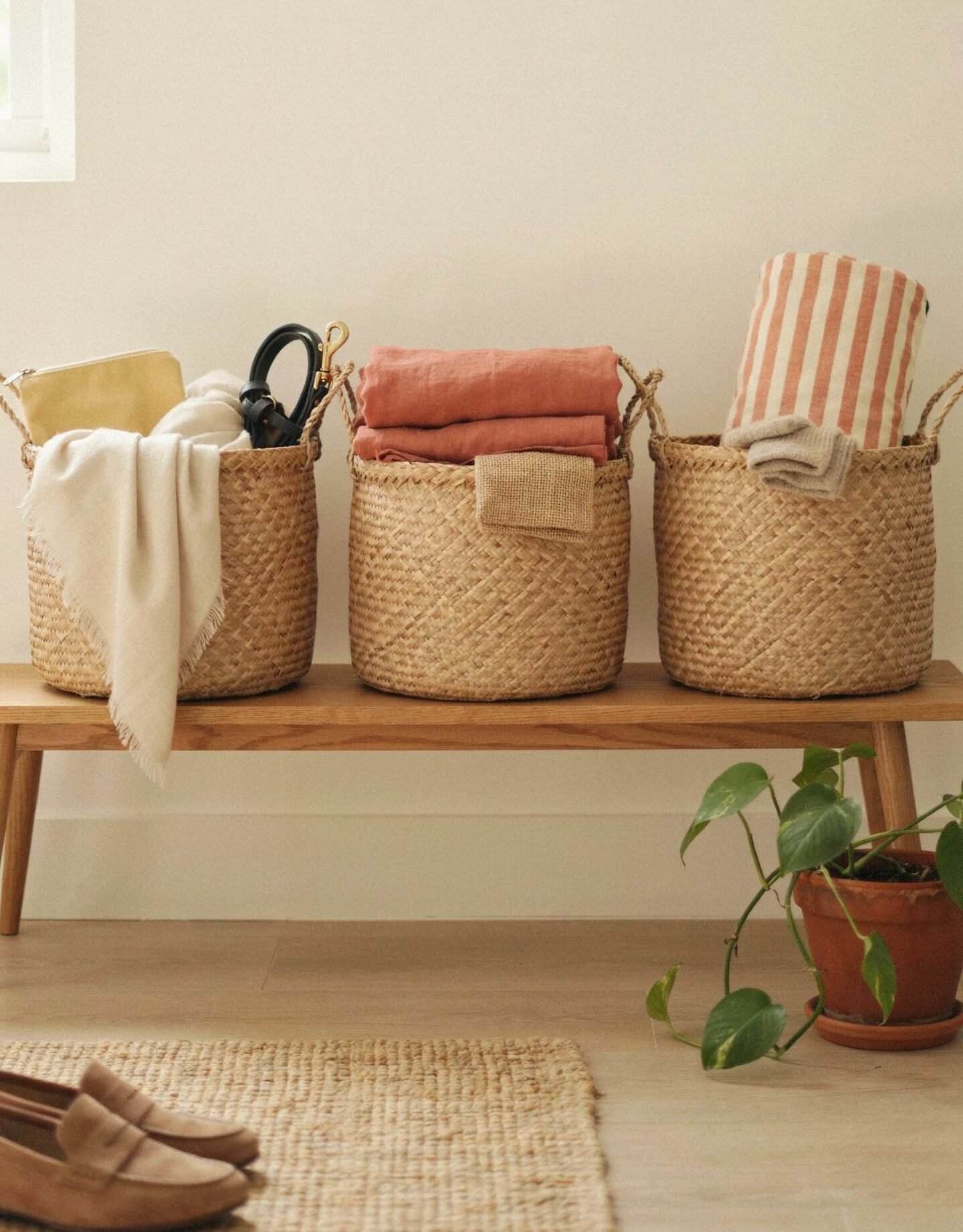 Three open basket bins for organizing